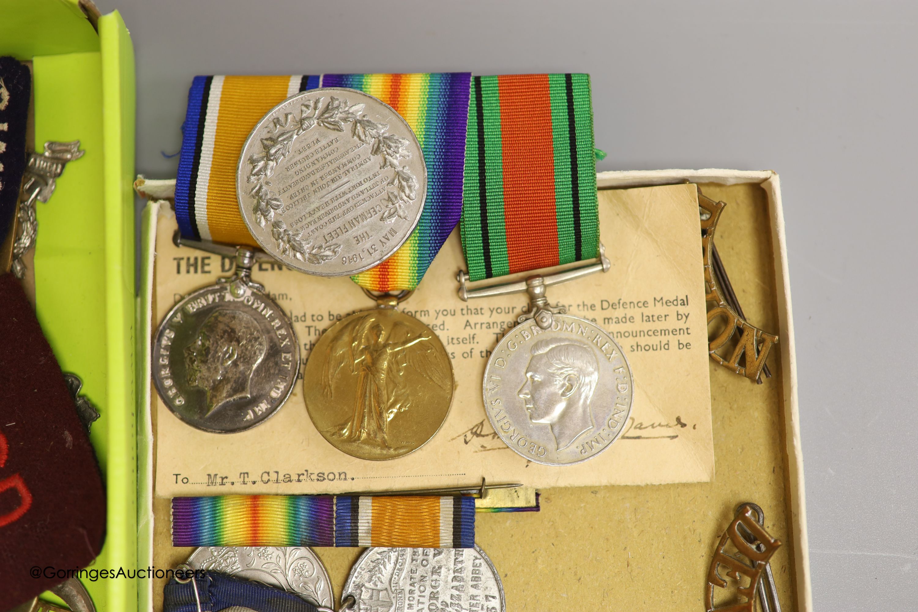 A trio of medals to 21783 Pte.R.Q.Clarkson. Wilts.R., cap badges etc